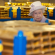 Queen Elizabeth inspecting stacks of gold at the Bank of England, which doesn’t actually have anything to do with Canadian currency, but is just kind of funny to look at (Photo by Eddie Mulholland - WPA Pool/Getty Images)